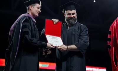Jason is presented with his diploma